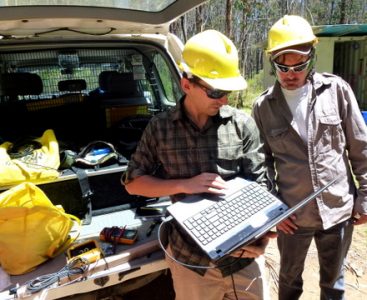 Cassidy Rankin (at left) of the University of Alberta works with University of Canberra student Michael Hausch (at right) on the AusCover Sensor Network at OzFlux's Tumbarumba site.